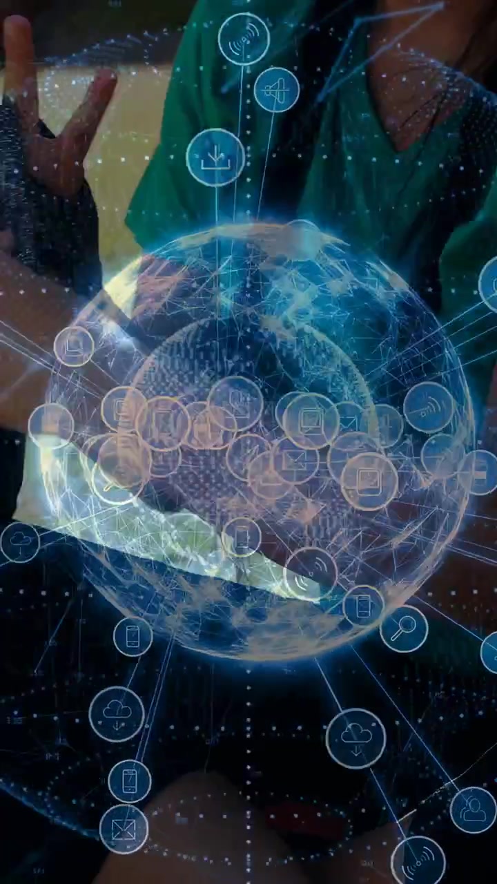 Vertical video: Woman sitting by tech globe, tilting phone and moving orbiting nodes for analysis