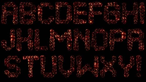letras brillantes y iridescentes de partículas de oro. alfabeto animado. un conjunto para componer palabras y frases. canal alfa. bucle.