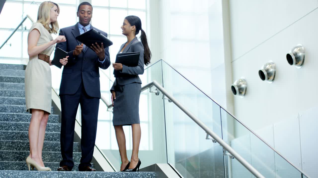 Multi ethnic business people meeting together in office