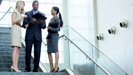 multi ethnic business people meeting together in office