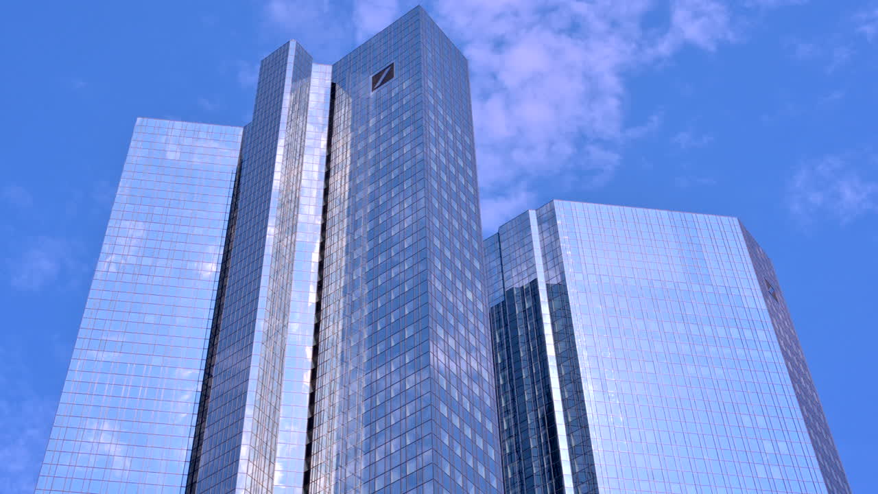Frankfurt, Germany - November 13, 2022: Low angle view of the Deutsche Bank Twin Towers in Frankfurt, Germany