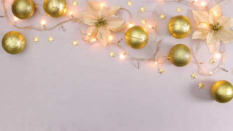 luces parpadeantes en la decoración de navidad de oro en la parte superior del tema de plata. detener el movimiento