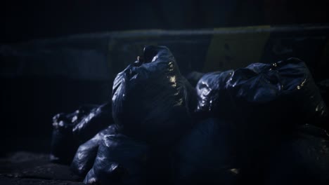 Garbage-bags-at-city-street-an-night