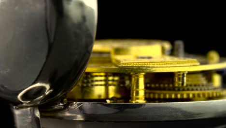 close-up of antique pocket watch mechanism