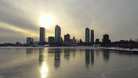 mirror reflection of downtown milwaukee, wisconsin over lake michigan [4k] [drone