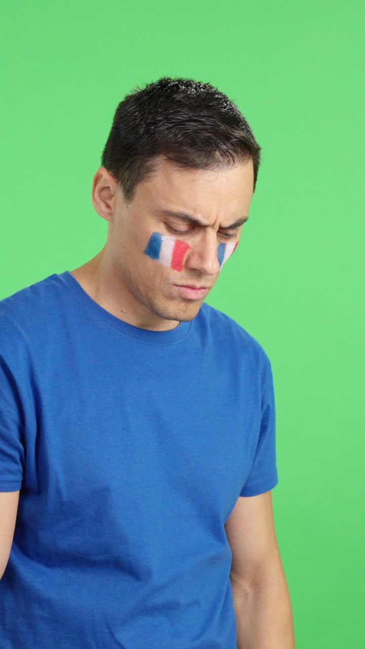 French patriot man looking away with serious expression