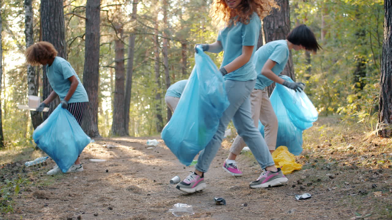 Community Volunteers Cleaning Up a Forest Path