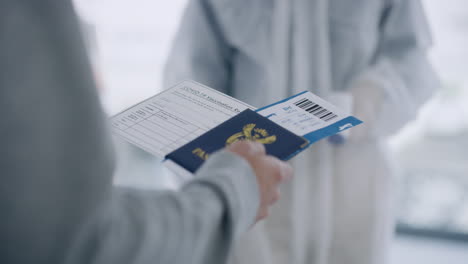 traveler having his temperature checked by airport