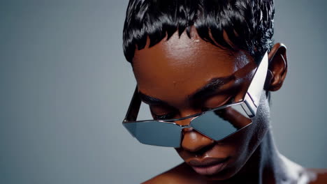 stylish african american woman in trendy sunglasses