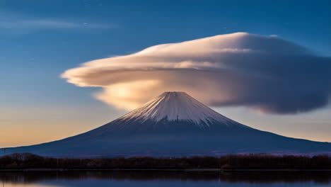 mount fuji with lenticular cloud at sunrise