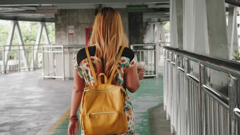 slow motion of beautiful fashion woman walking in the city