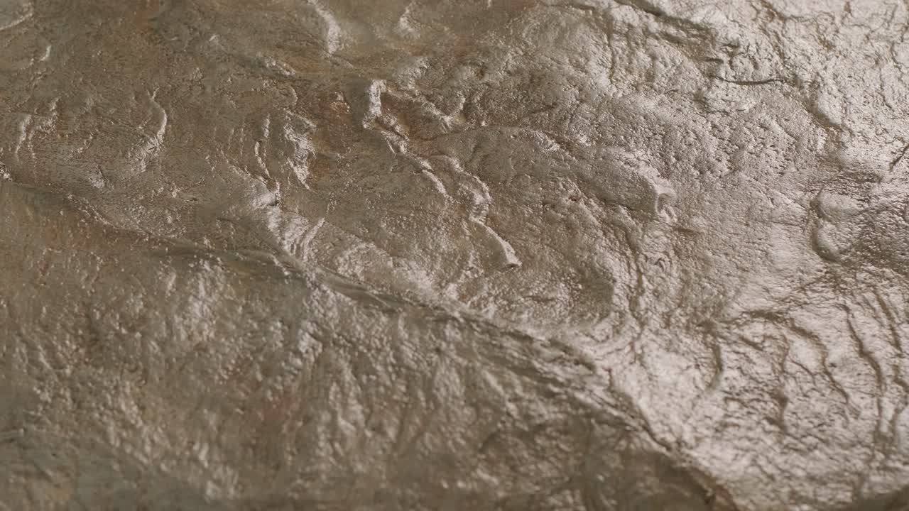 Plastered decorative wall under the stone