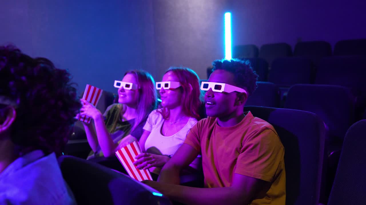 People Enjoying a 3D Movie at the Cinema