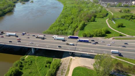 Aerial-following-shot-elevated-multiple-roads-junction