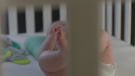 baby feet in crib
