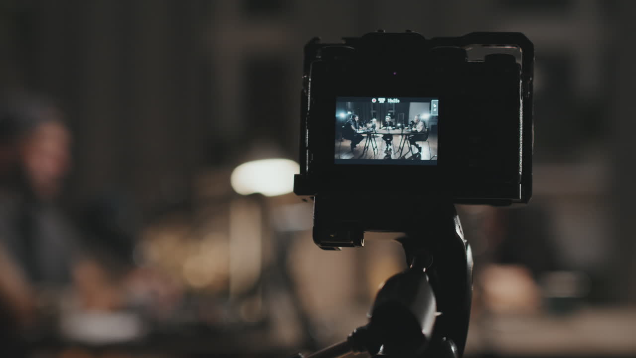 Video Camera Recording People Doing Podcast