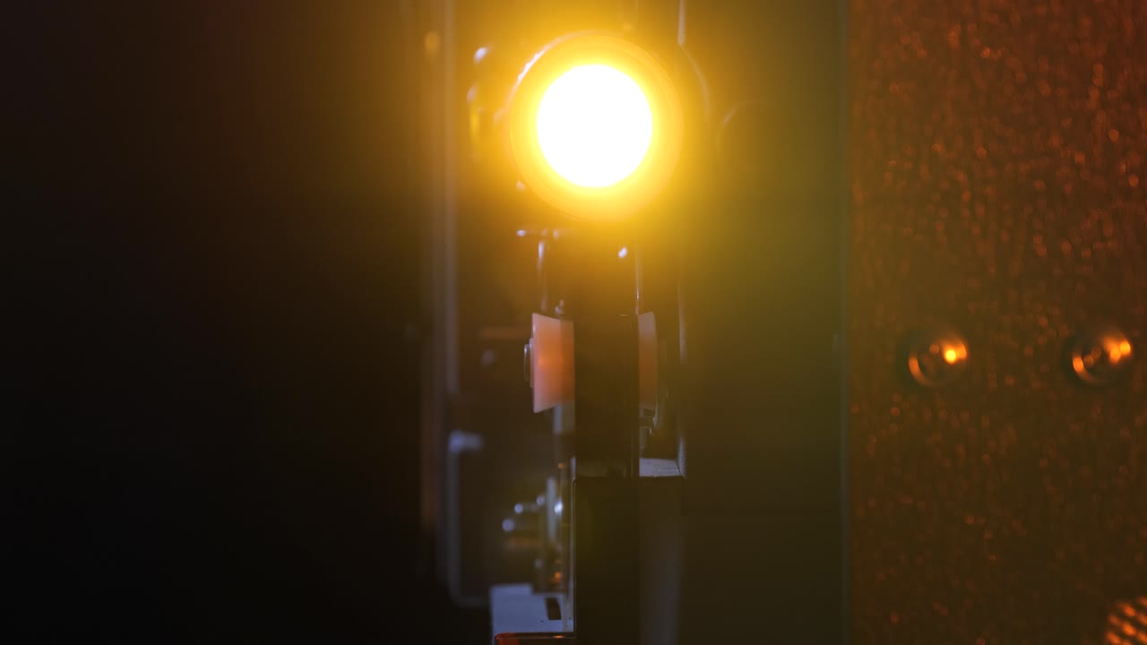 16mm movie projector crane shots in a smokey room