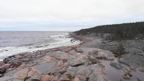 Baltic-sea-Nordic-rocky-shore-in-east-Sweden---Aerial-fly-over