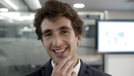 Closeup-shot-of-handsome-young-man-looking-at-camera