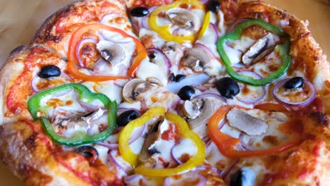 Close-up-of-delicious,-tasty-and-homemade-Italian-pizza-with-cheese,-tomato-and-peppers