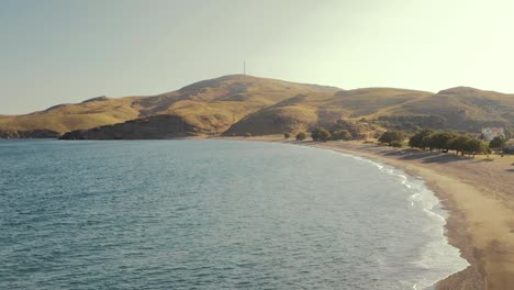 idyllic secluded beach on lesvos island, greece morning sunrise