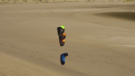 kitesurfing on a sandy beach