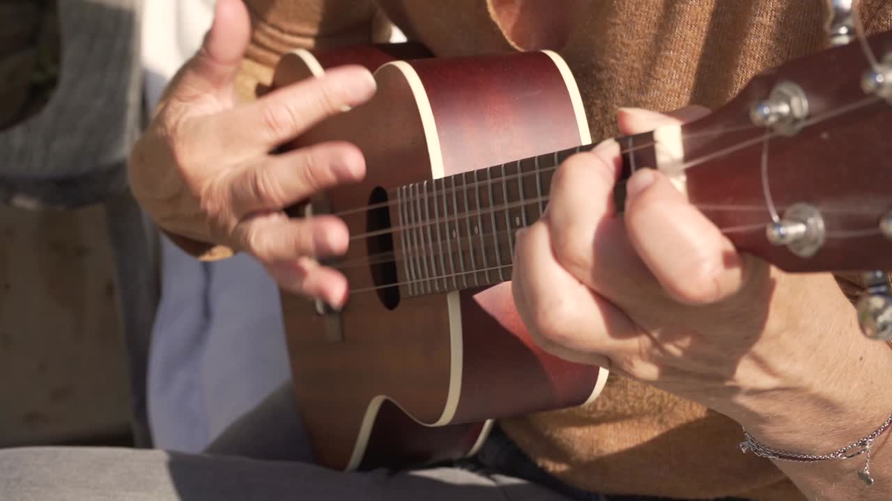 Ukulele practice, hands on ukulele