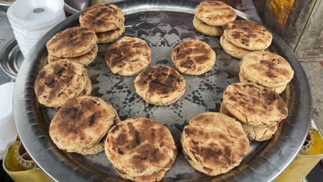 Close-up-shot-of-popular-dish-Litti-choka-prepared-in-Bihari-dish-at-a-bihari-foodstall-in-Bihar,-India