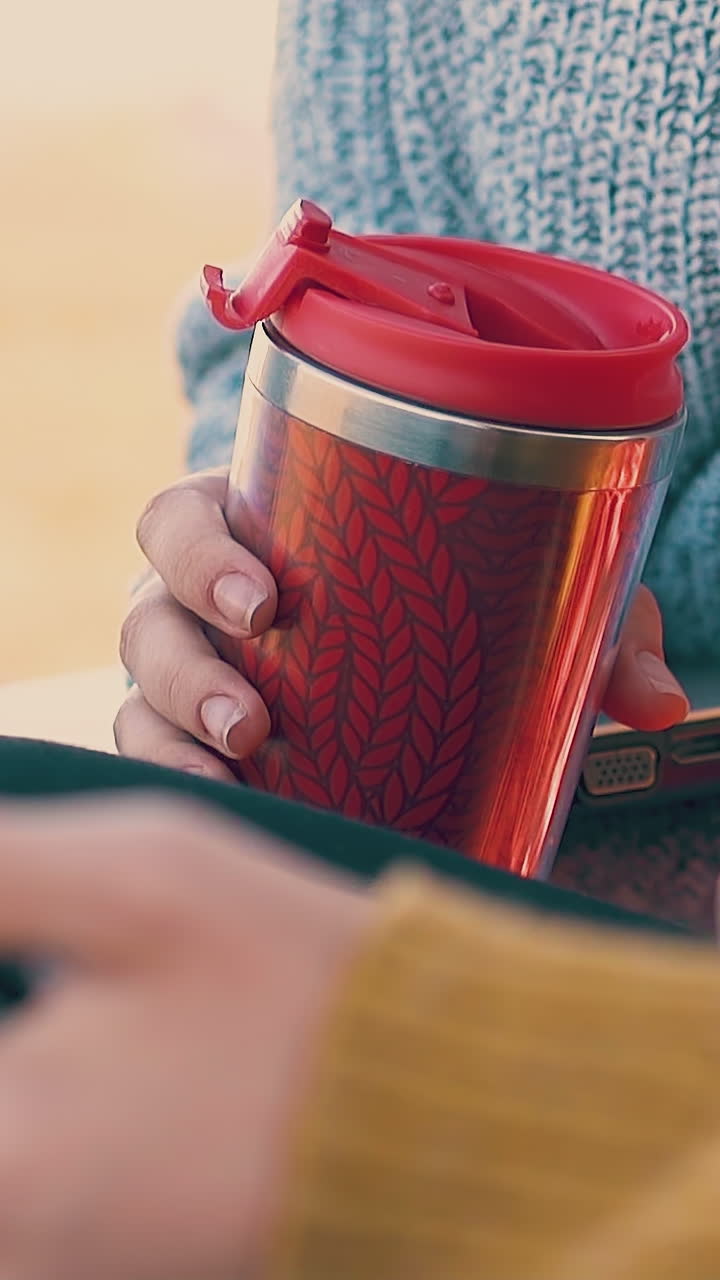 young women tourists use modern tablet and laptop in camp in early morning close view slow motion