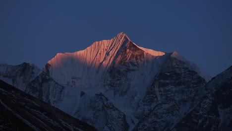 close up view of the red sunset on gangchempo mountain