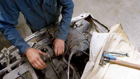 mechanic fixing a car 4k