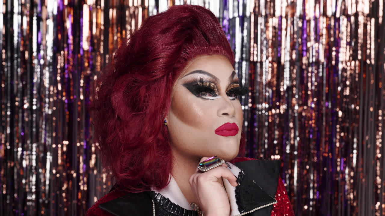 Portrait of a Drag Queen with Bold Makeup and Red Hair