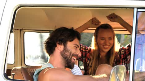 Hipster-couple-dancing-in-the-van