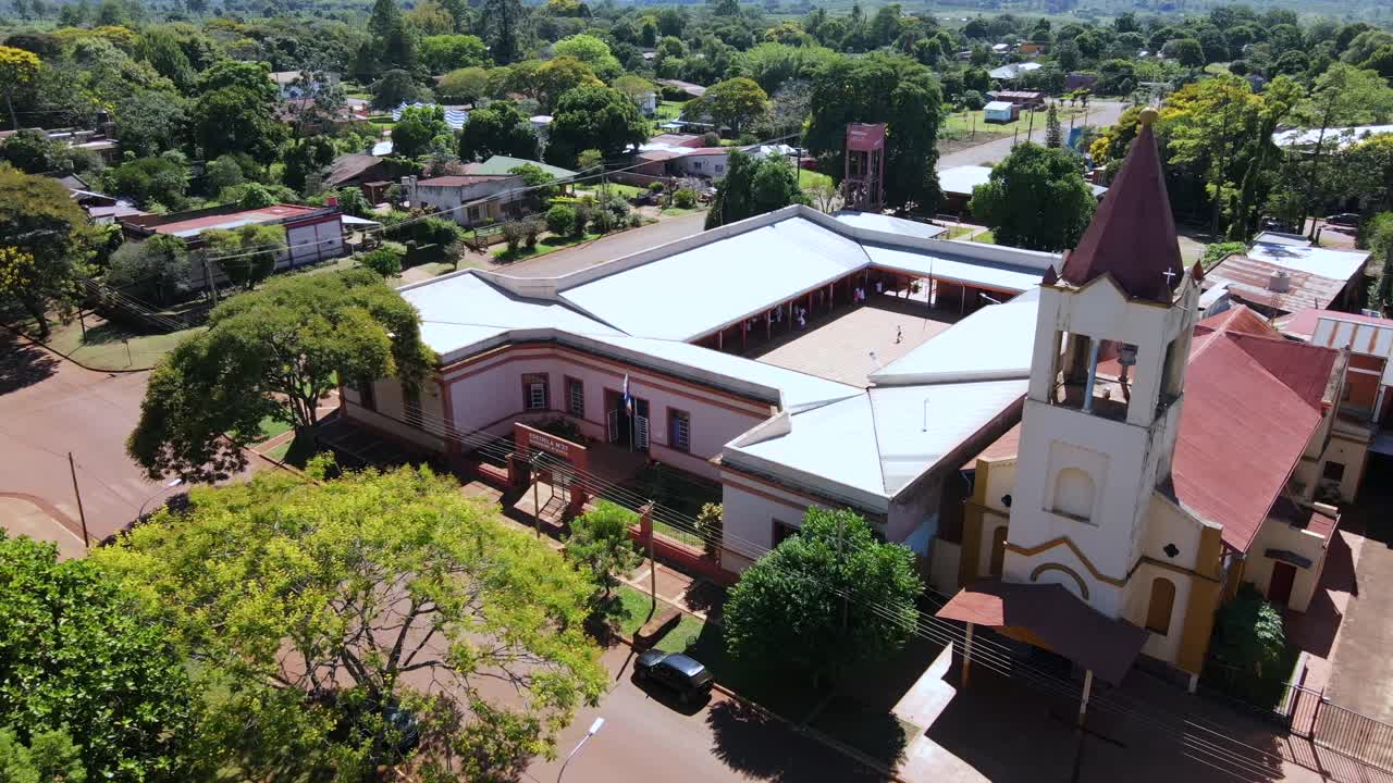 Aerial View of a Small Town in Paraguay with Church and School