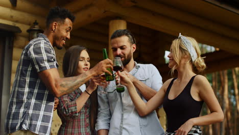 Positive-guys-talking-on-bbq-party-outdoors.-People-having-rest-on-backyard