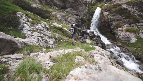 traveller witnessing the magic of cascada de sorrosal broto spain