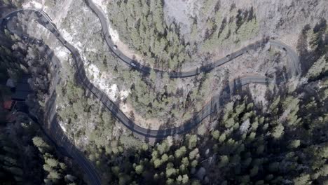 switchback road with cars driving on highway 89 a in sedona, arizona with drone video overhead stable