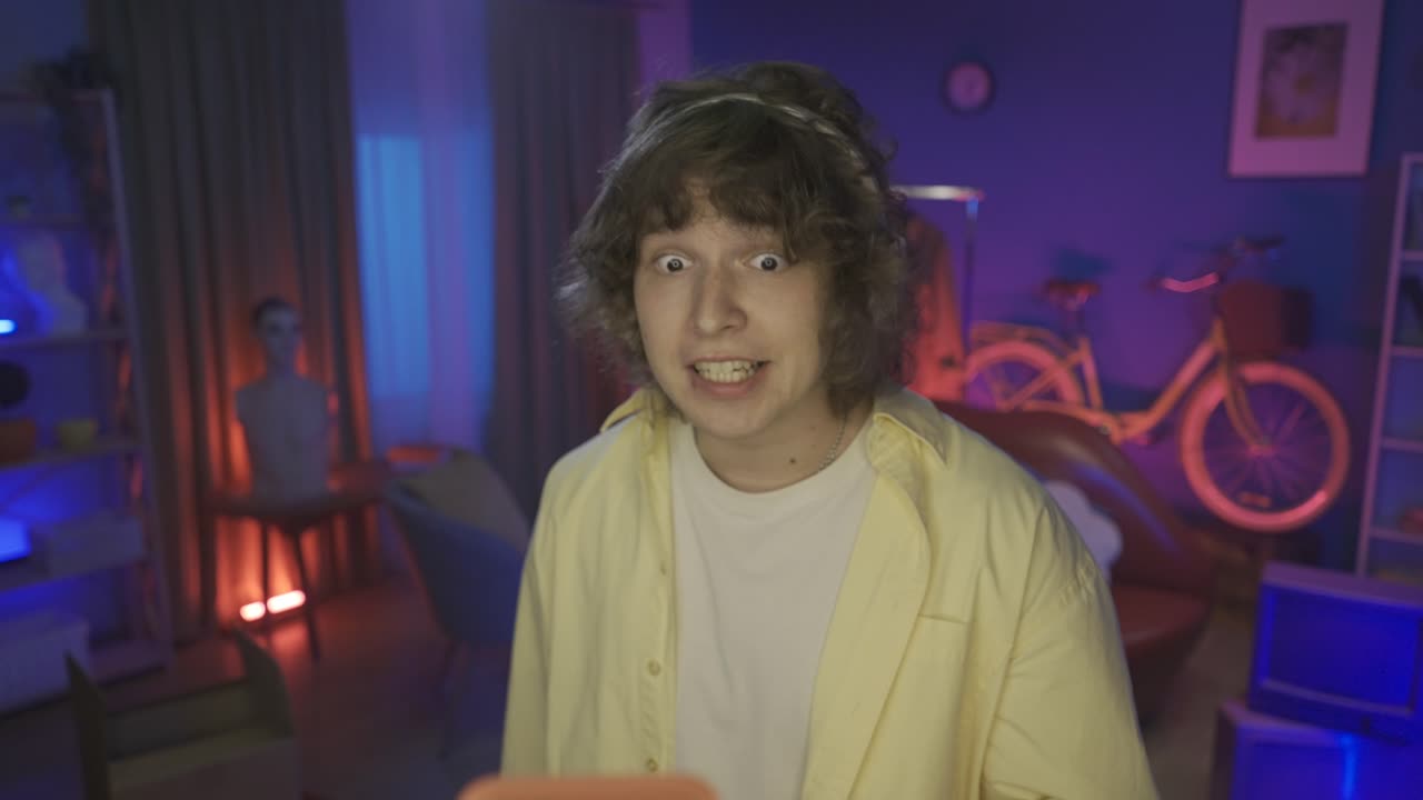 Young Man Streaming on Ring Light