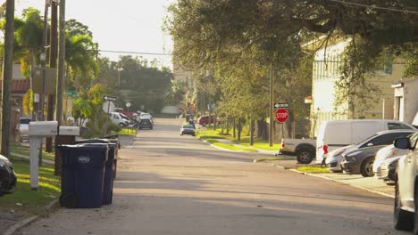 Empty-street-with-cars-passing-by-in-the-distance