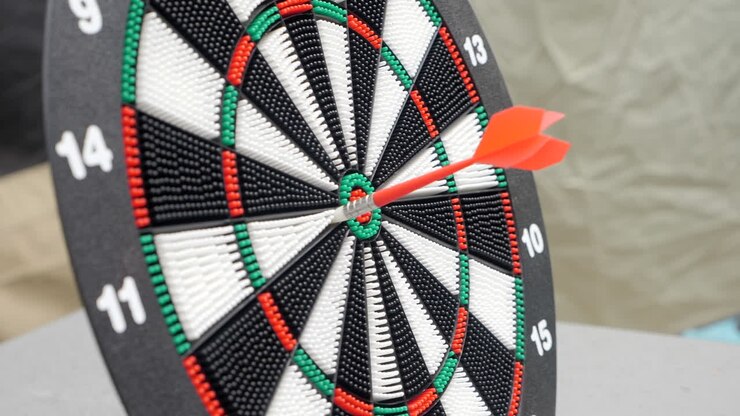 CLOSE UP Plastic Outdoor Dart Thrown At Board SLOW MOTION