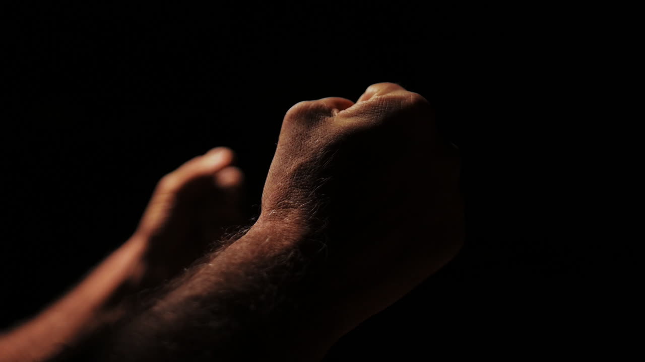 Powerful and emotional close up of hands gestures of a speaking male