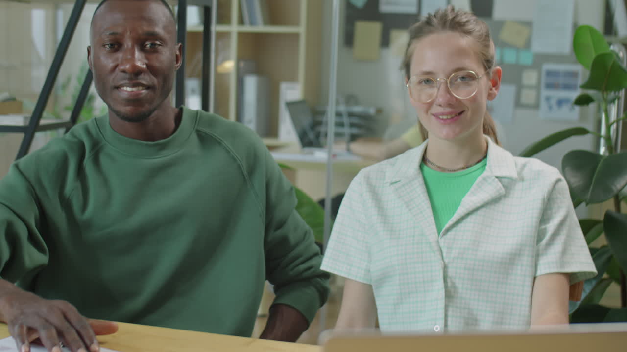 Portrait of Cheerful Gen Z Coworkers in Office