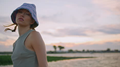 calm model resting river on beautiful evening closeup. serene casual girl posing