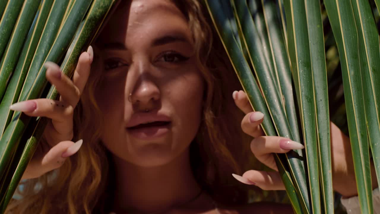 Woman in Palm Leaves