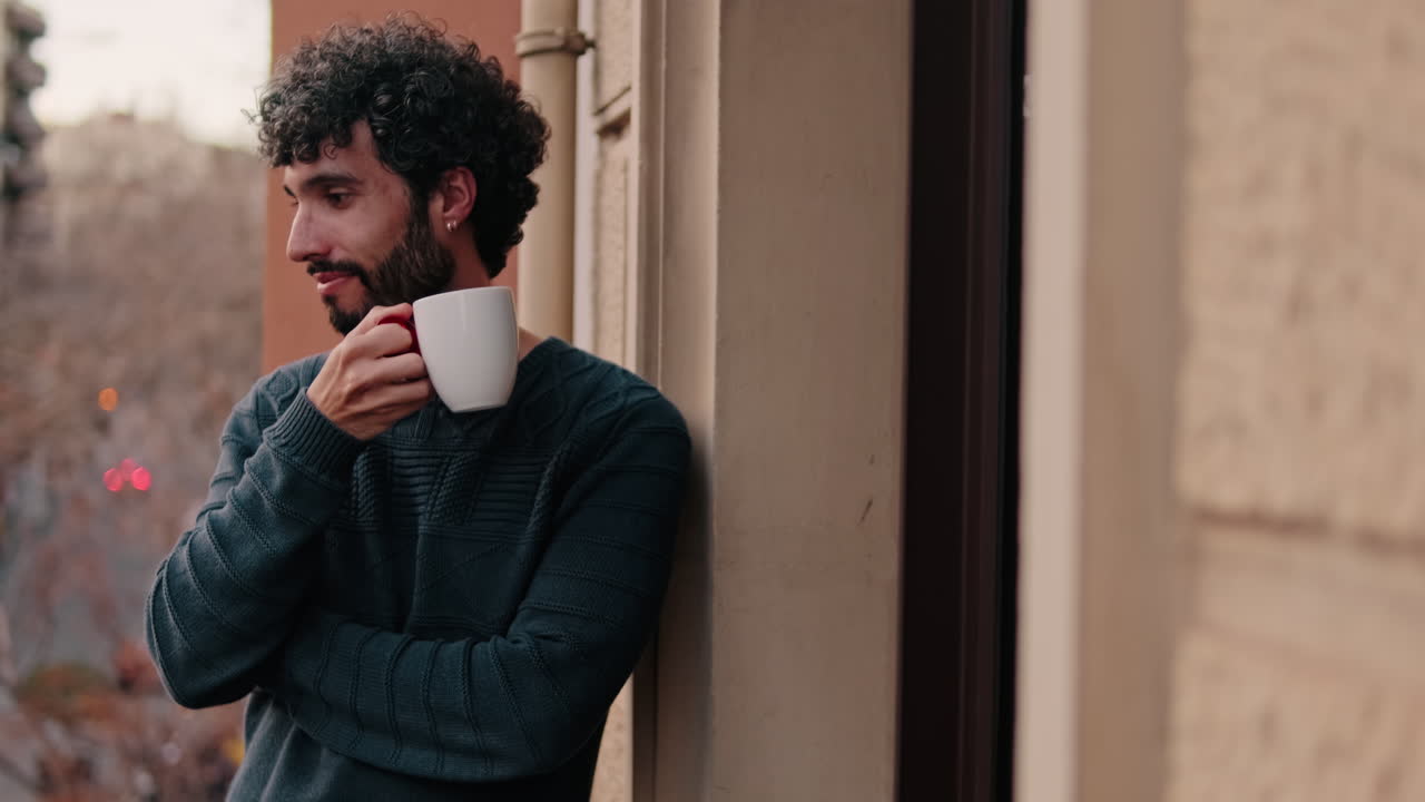 Gay Couple Enjoys Morning Coffee at Home