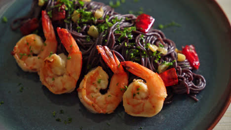 stir-fried black spaghetti with garlic and shrimps