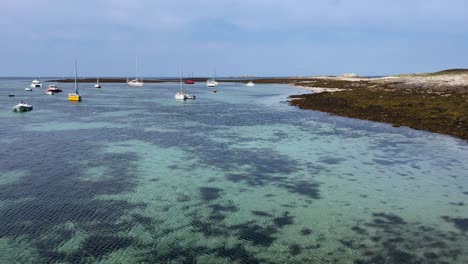 view of harbour and idyllic island ile saint nicolas in brittany, france