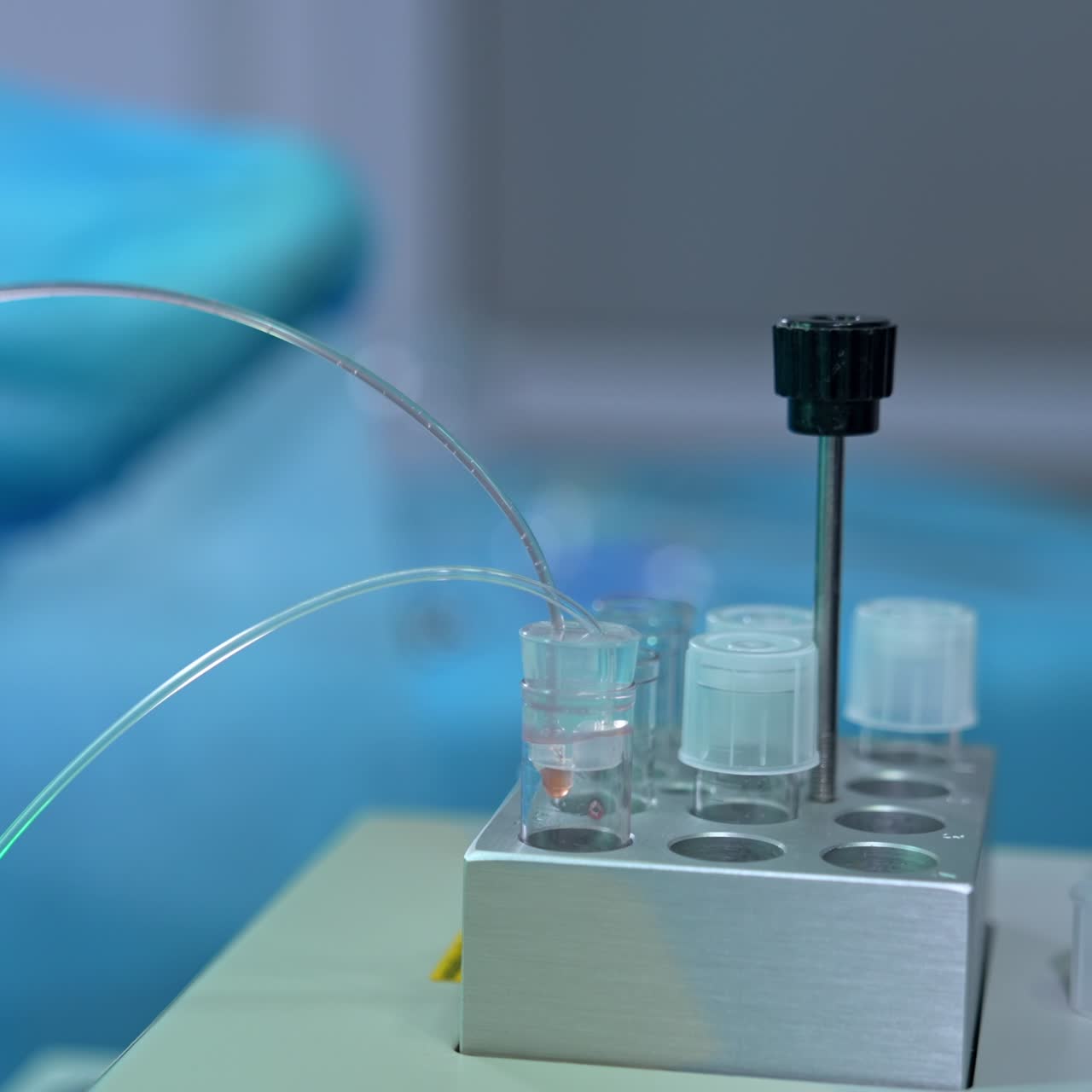 A set of test tubes in the special stand. Equipment used for extracorporeal fertilization procedure. Close up