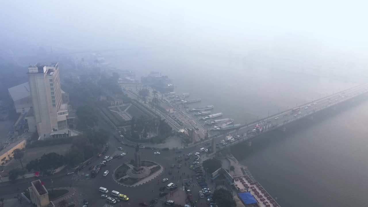 Nile river Cairo Egypt foggy sunrise traffic