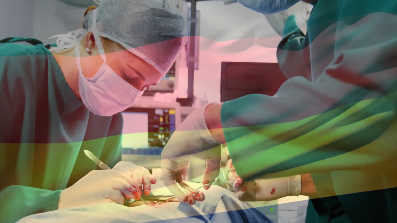 Surgeons performing surgical procedure in operating room, with animated heart icon and data graphs
